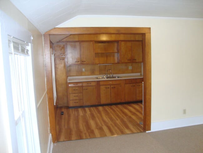 Kitchen from Living Room. - 415 Oak Dr Unit Fl. 2