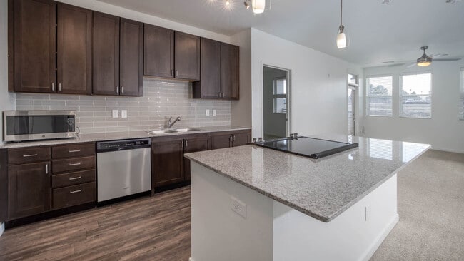 Kitchen with Stainless Steel Appliances and Breakfast Bar