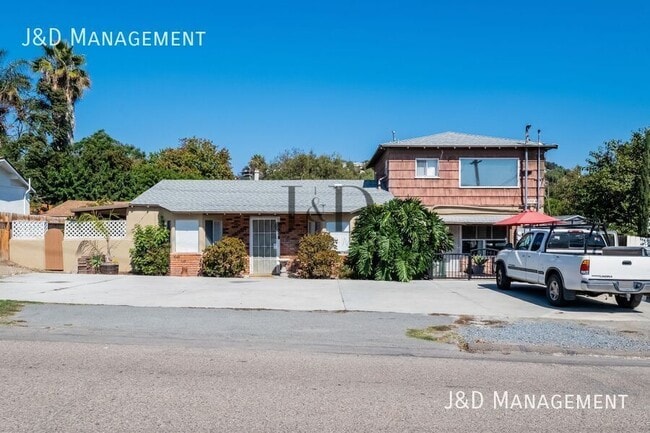 Building Photo - 8770 Lamar St Unit A