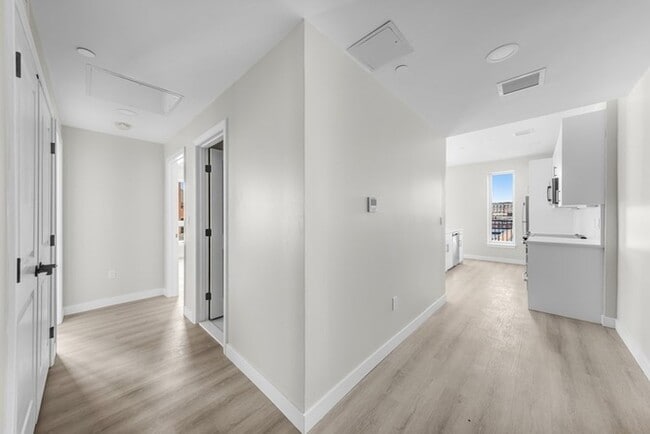 Photo - Modern 2BR / 2BA Condo with Balcony, 2 Covered Parking Spaces & Roof Deck Unit 404