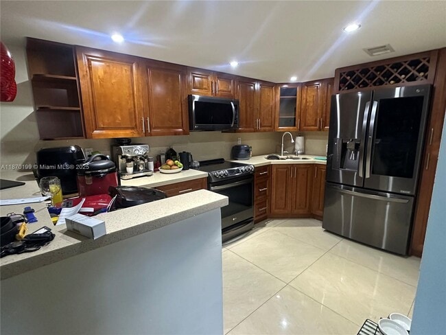 Building Photo - 6801 Harding Ave Unit 317 Rental
