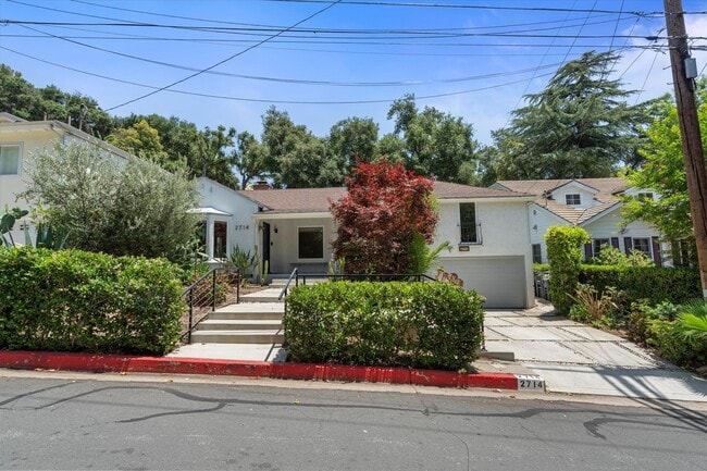 Photo - This beautifully updated 4-Bed, 2-Bath Hom...