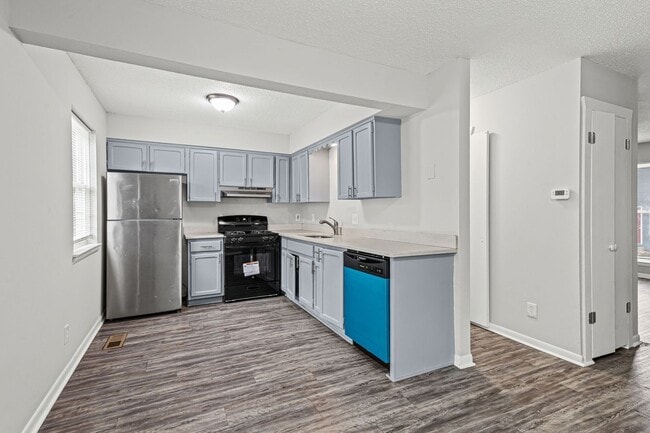 Photo - Summer Special! Updated 3BR Townhome with Basement + $250 Off First Month’s Rent