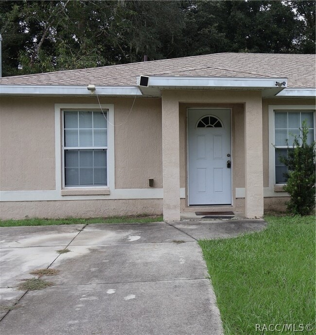 Building Photo - 9047 N Travis Dr