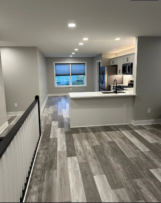 Living room looking into kitchen - 8195 Lake Pleasant Rd