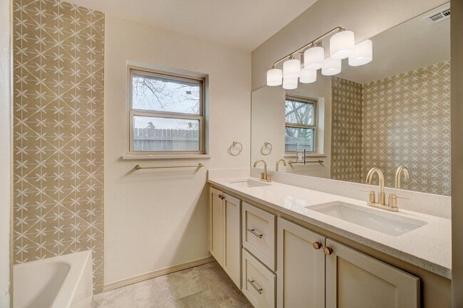 Photo - A beautifully renovated 4 bedroom home in The Village!