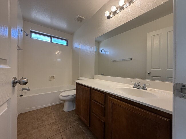 Photo - "Spacious 4-Bedroom Haven with 2 Bath Retreats in Laveen's Heart – 1,893 Sq Ft of Comfort!"