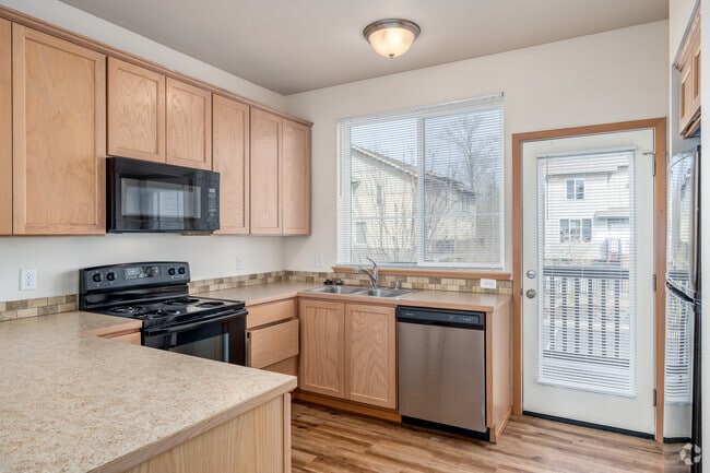 2BR, 2.5BA - 1,106SF - Kitchen