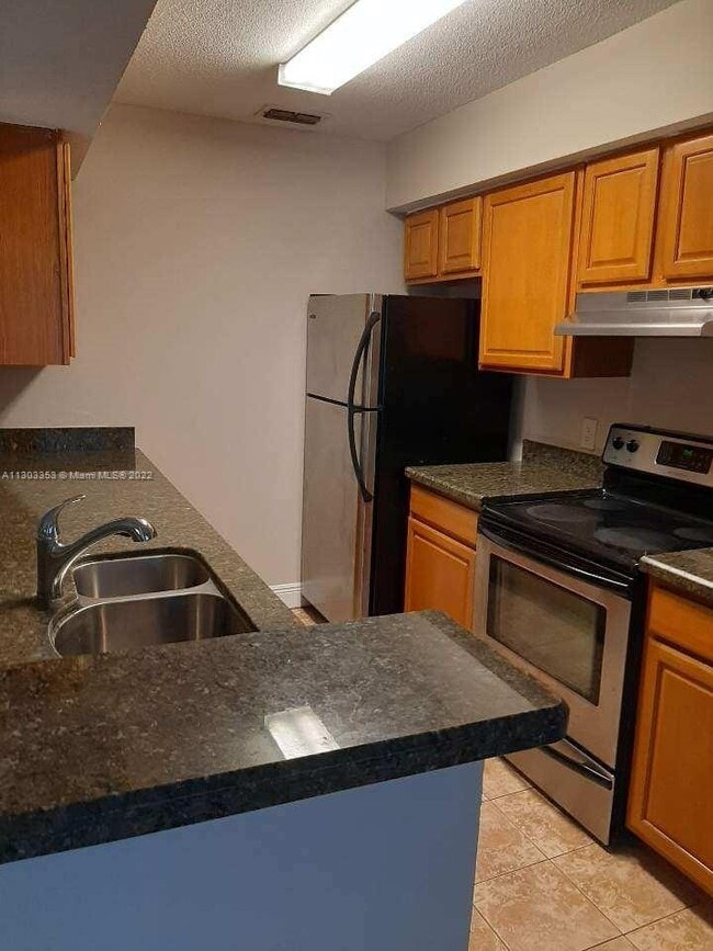 Photo - 2622 NW 33rd St Condo Unit 2014