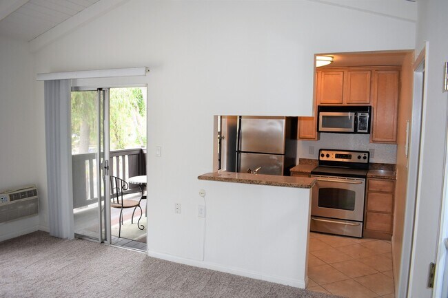 Photo - Upper-Level Condo with Vaulted Ceilings & Granite Finishes Unit B2