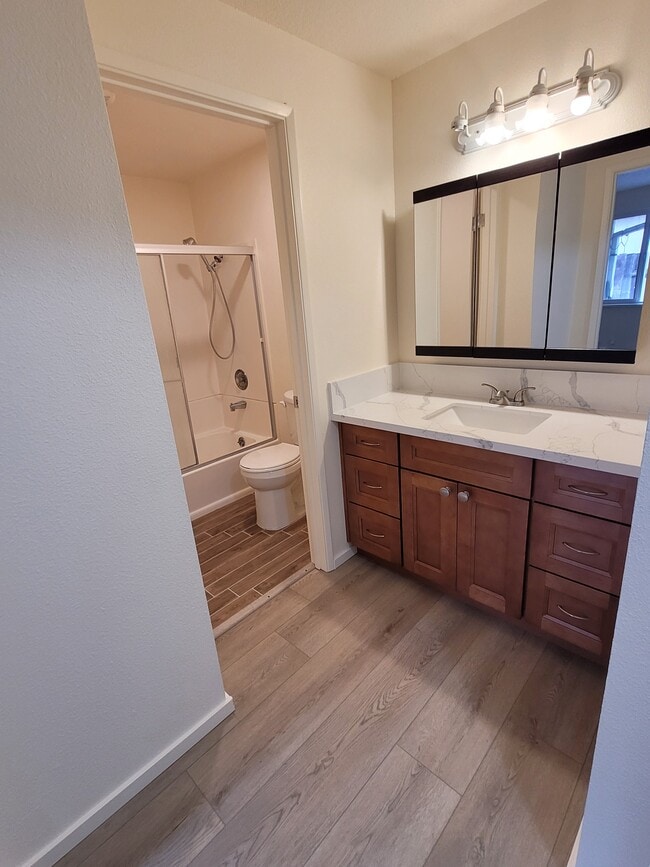 Separate vanity space from shower/toilet area. - 1045 S Jasper St Unit #a