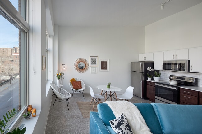 Open Living Spaces and stainless steel kitchen - Bluebird Flats