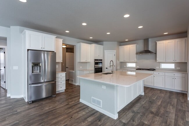 Photo - Exceptional 4-Bedroom Home with Dual Fireplaces, Main Level Master Suite, and Spacious Basement -...