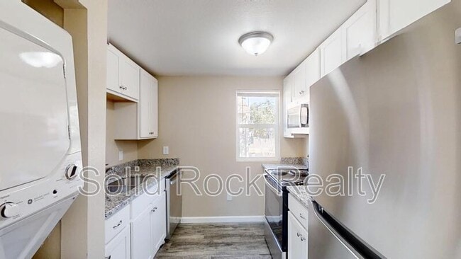 Building Photo - 2405 E St Vrain St Unit 105