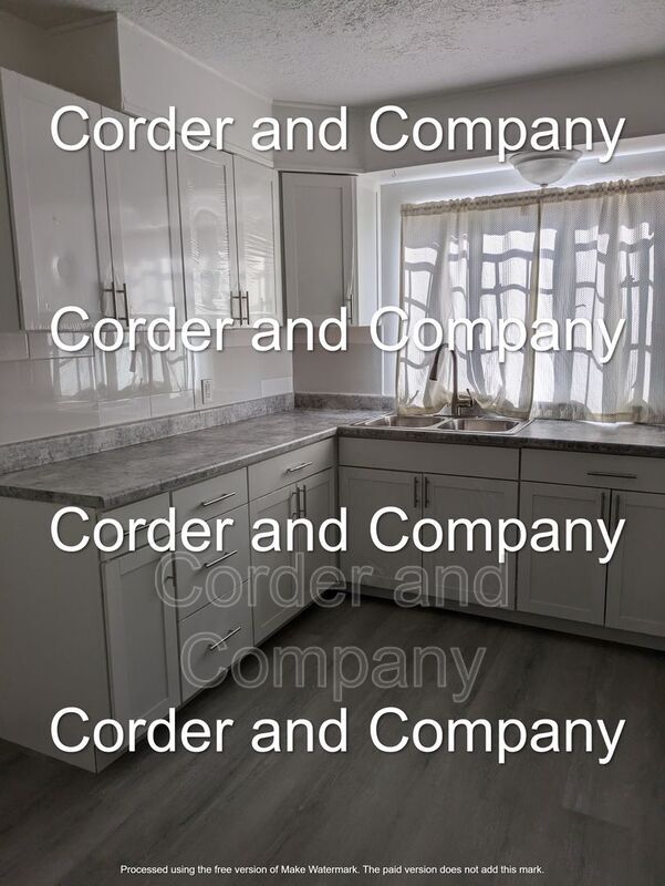 Photo - 211-1211 Adams St NE