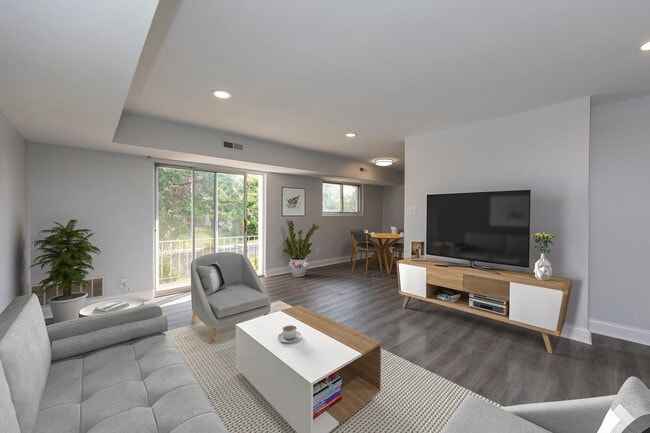 Living Area/Balcony-Renovated - Hamilton Court East Apartments