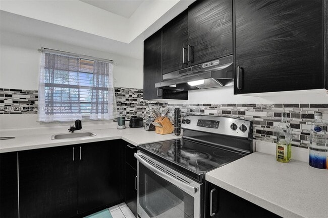 Building Photo - 3530 NW 43rd Ave Unit 203