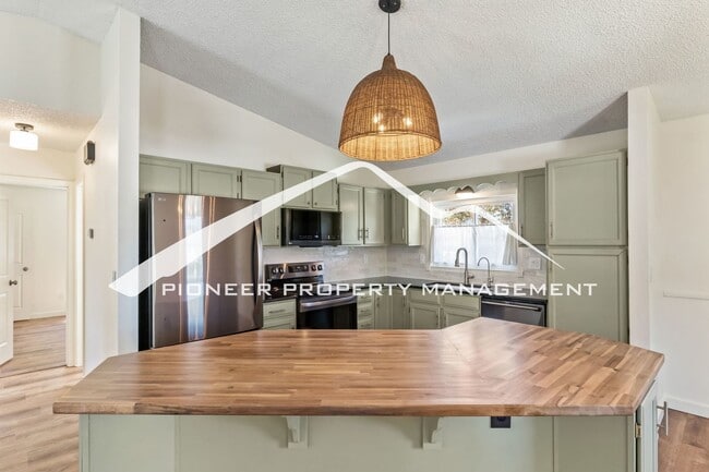 Photo - Updated 4 Bed, 2 Bath Home in Briargate with Mountain Views, fully fenced yard, 2 car garage and AC