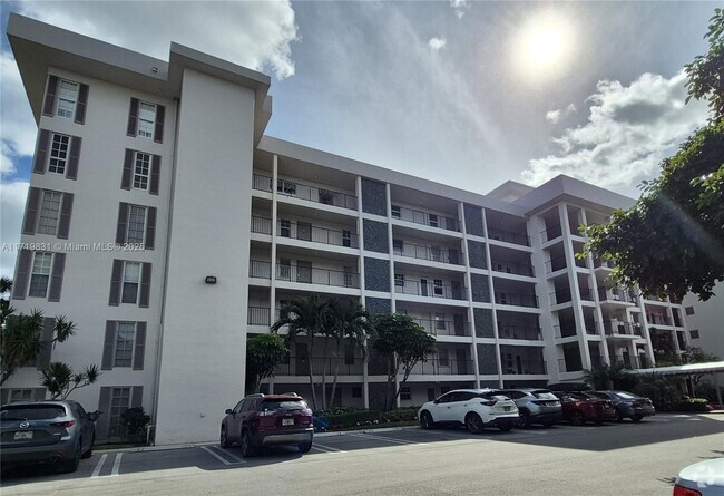 Building Photo - 2850 N Palm Aire Dr Unit 106 Rental