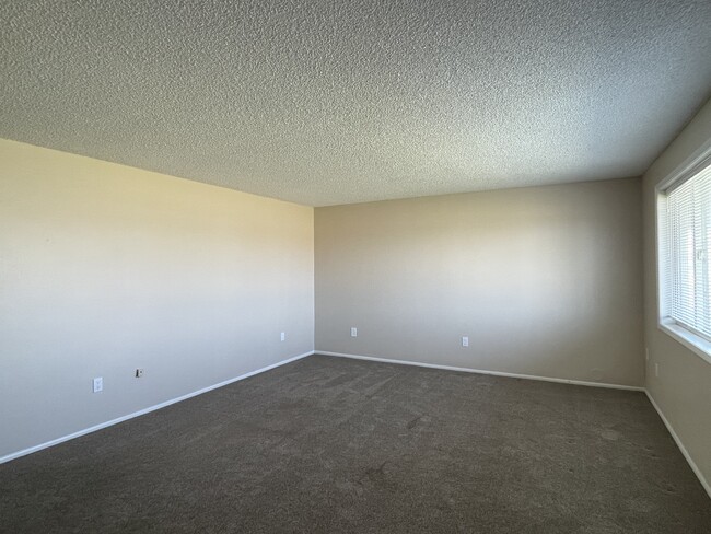 Living room with big picture window - 46398 Max Harder Rd N Unit Apt B
