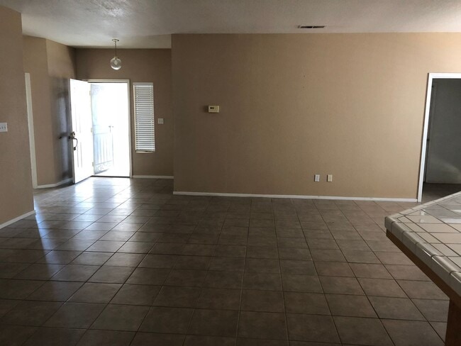 Photo - Coming Soon: Spacious 3 Bedroom, 2 Bath Tevis Ranch Home with Fireplace, Covered Patio & 2-Car Ga...