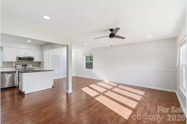 Photo - "Discover Comfort and Space in Charlotte: 4-Bed, 3-Bath Gem on Red Carriage Lane!"