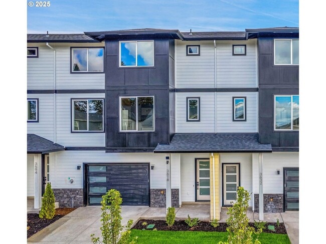 Building Photo - Newly Built Modern Open-Concept Condo with Island Kitchen, Granite Counters and a Deck