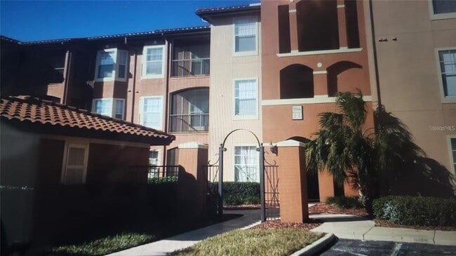 Building Photo - 5566 Metrowest Blvd Unit 306