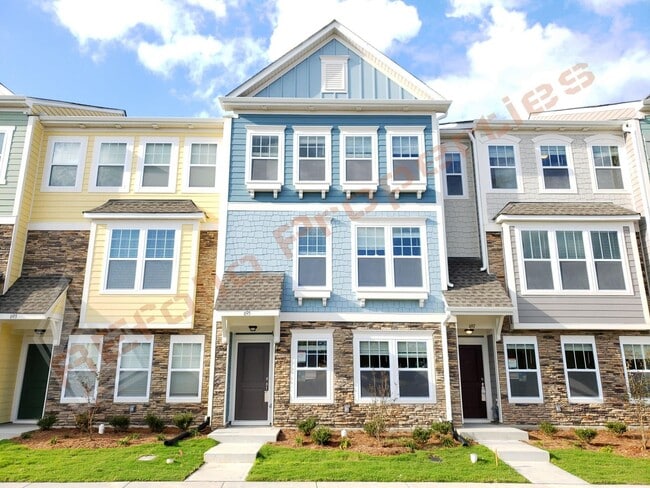 Photo - Beautiful Luxury 3 Story 3 Bedroom Townhome with 1st Floor Guest Suite, Attached 2 Car Garage, Co...