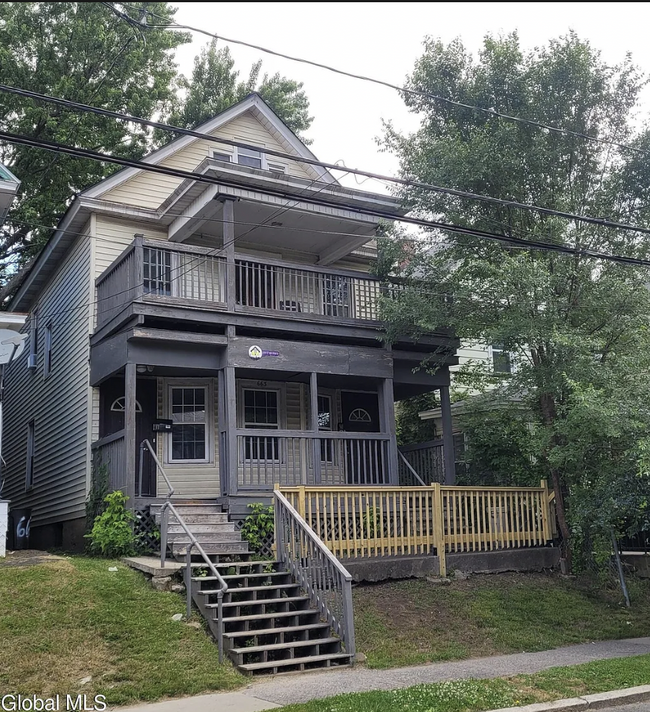 Front of house, right side door is apartment - 663 Myrtle Ave Apartments Unit 1