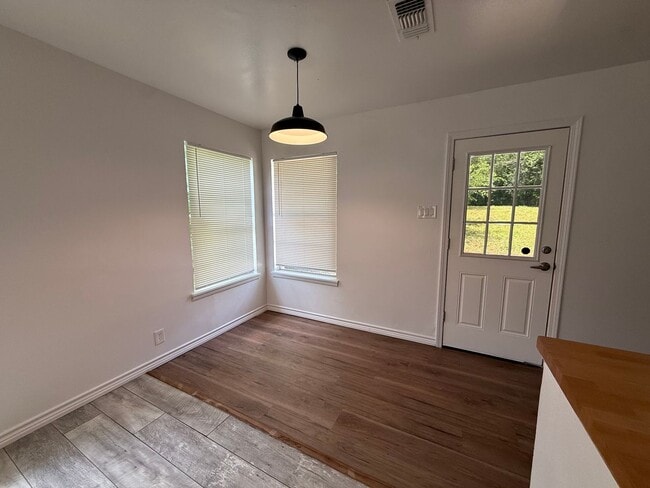 Photo - Charming 3-Bedroom Home with Hardwood Floors & Spacious Backyard