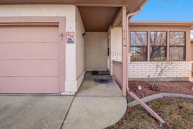 Photo - Charming 2-bedroom, 2-bathroom townhome with a 1-car garage