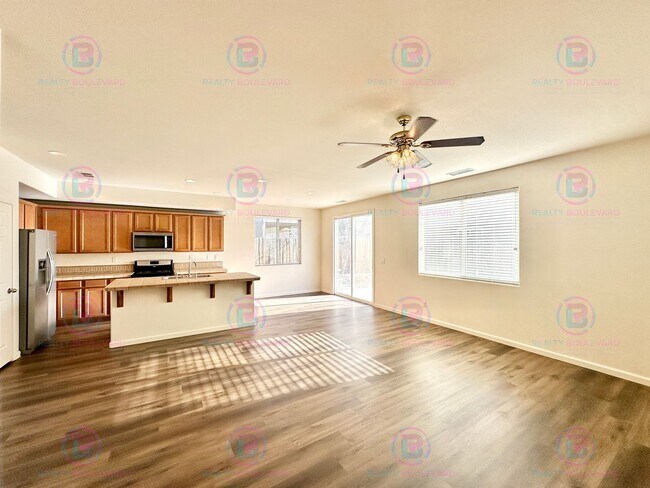 Photo - Spacious 4-Bedroom 3 Bath, 3 Car Garage Home with Loft, Living Room and Family Room Outdoor Kitch...