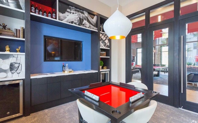 Salón para residentes con área de juegos