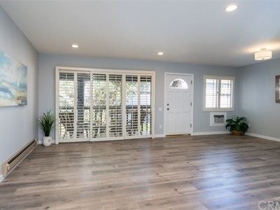 Living Room /Dining looking out - 310 S Miraleste Dr Condo Unit 67