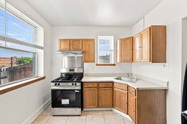 7443 S Paxton Ave Unit 2