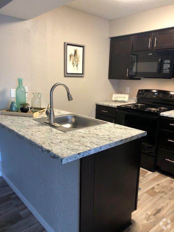 Renovated Kitchen - Brickstone at Woodlawn LLC Rental