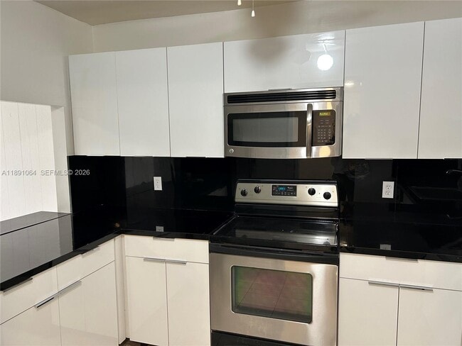 Photo - 9430 Live Oak Pl Unit 404