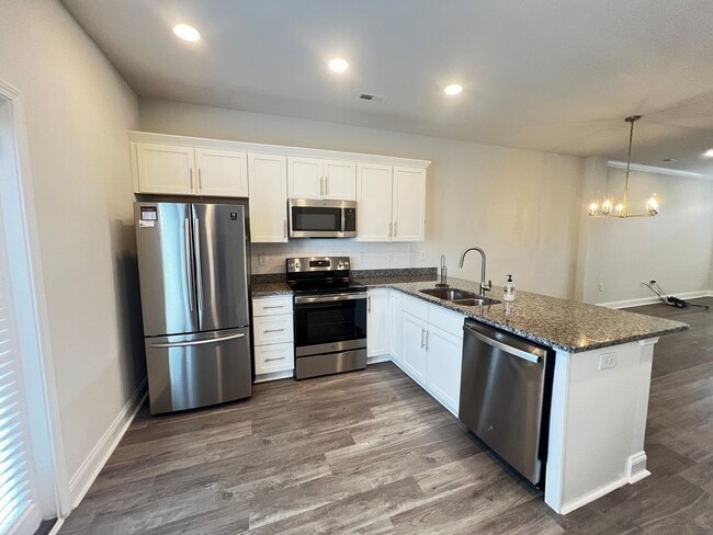 Photo - Available Now! - Pet Friendly 2 Bedroom, 2.5 Bath Townhome at Market Common! Cable and Internet I...