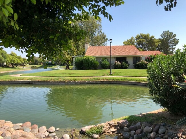 Building Photo - Beautiful Home on the Lake Just Steps Away from Rec 1 Pool & Fitness Center in Leisure World a 45...