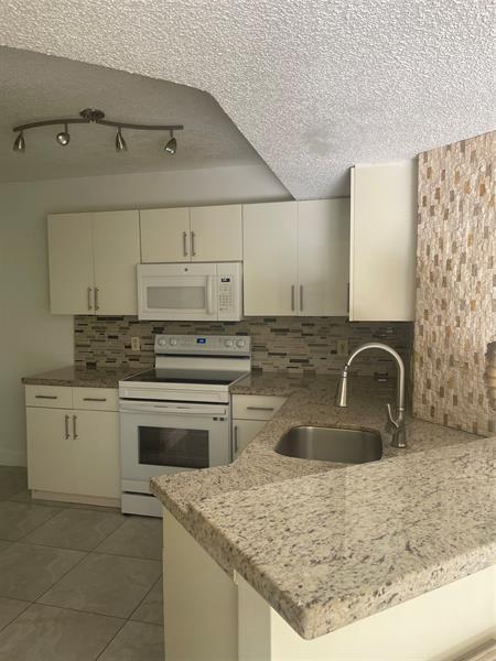 Photo - 8801 Wiles Rd Condo Unit 208
