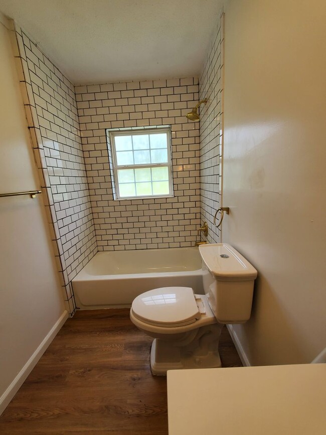 Photo - Spacious 4BR/2BA Home with Brick Exterior, Large Open Living Area, and Pet-Friendly in Valdosta, GA!