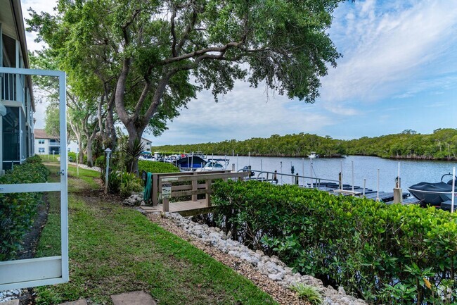 Building Photo - BOAT NATURE OR WATER ENTHUSIASTS? ENCLAVE... Unit 504 Rental