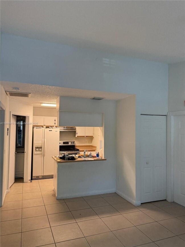 Building Photo - 18348 NW 68th Ave Unit G Rental