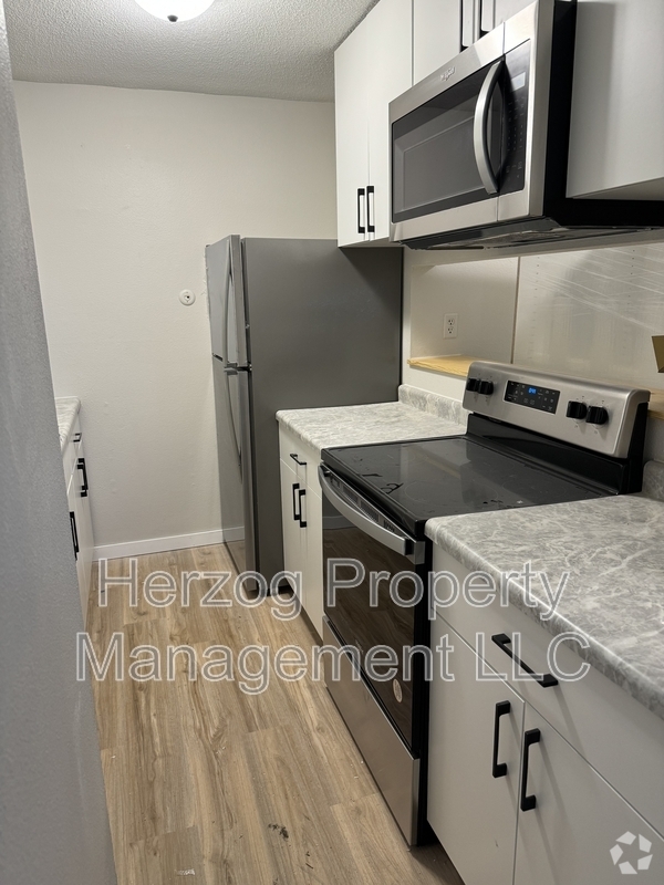 Building Photo - 307 27th St SW Unit Apt 5