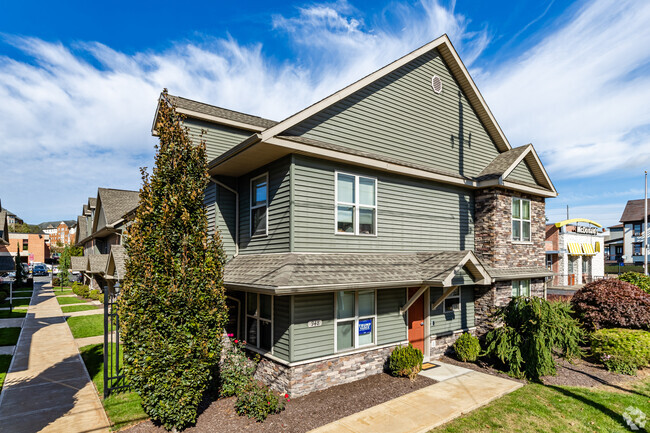 Building Photo - The Cottages on Campus Rental