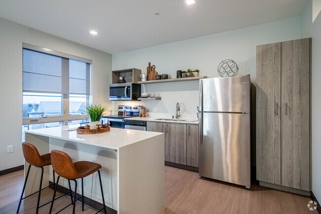 1BR, 1BA + Den - 845SF