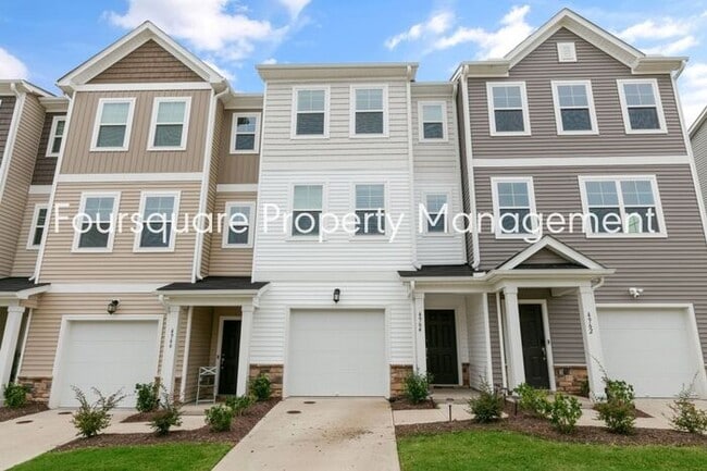 Photo - Stylish 3-Level Townhome with Bonus Suite, Deck & Garage – Near I-540 and Shopping