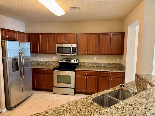 Photo - 11601 NW 89th St Condo Unit 207