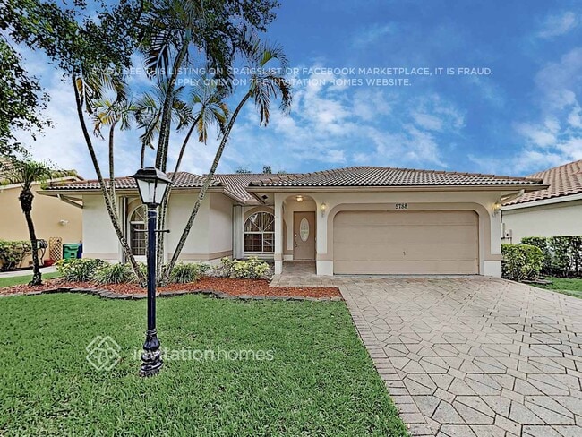 Building Photo - 5788 NW 48th Dr
